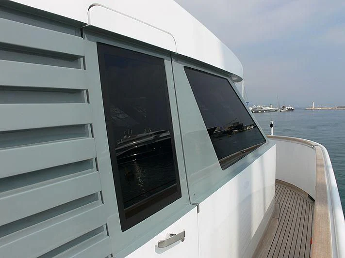 a boat with a window aboard LADY IN BLUE Yacht for Sale