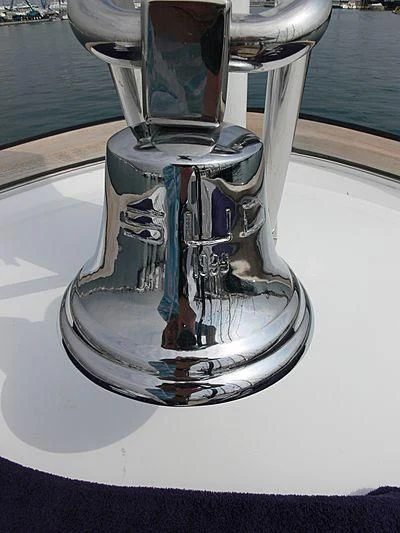 a glass of wine on a table aboard LADY IN BLUE Yacht for Sale