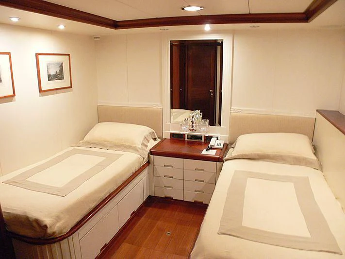 a room with two beds aboard LADY IN BLUE Yacht for Sale