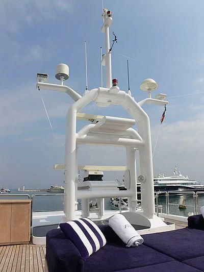 a large white wind turbine aboard LADY IN BLUE Yacht for Sale