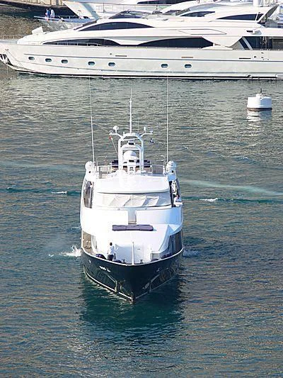 a couple of boats on the water aboard LADY IN BLUE Yacht for Sale