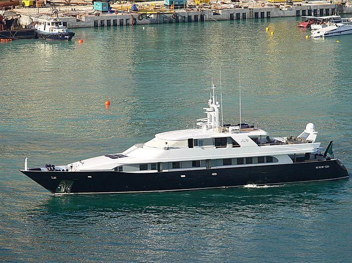 a large boat in the water aboard LADY IN BLUE Yacht for Sale