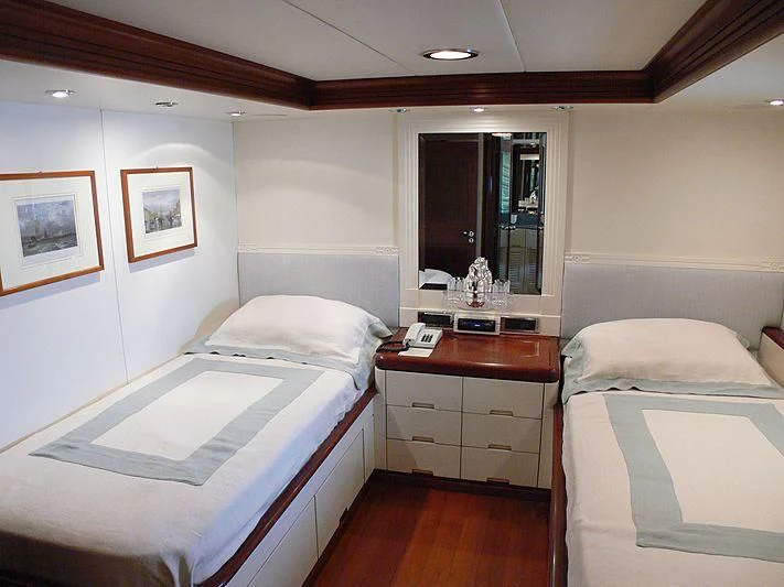 a room with two beds aboard LADY IN BLUE Yacht for Sale