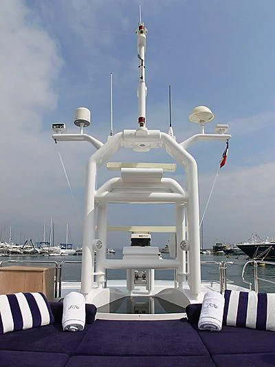 a large white tower with a satellite on top aboard LADY IN BLUE Yacht for Sale