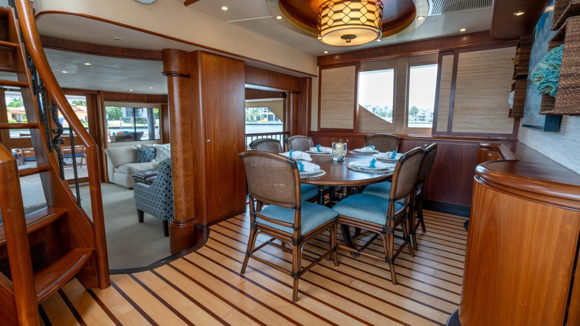 a dining room with a table and chairs aboard FAN TAIL Yacht for Sale