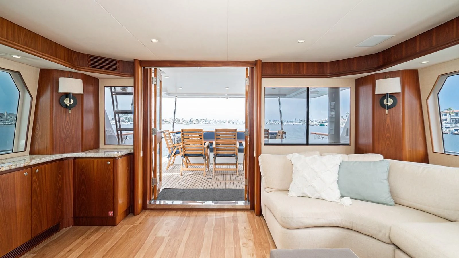 a living room with a large glass door aboard FAN TAIL Yacht for Sale