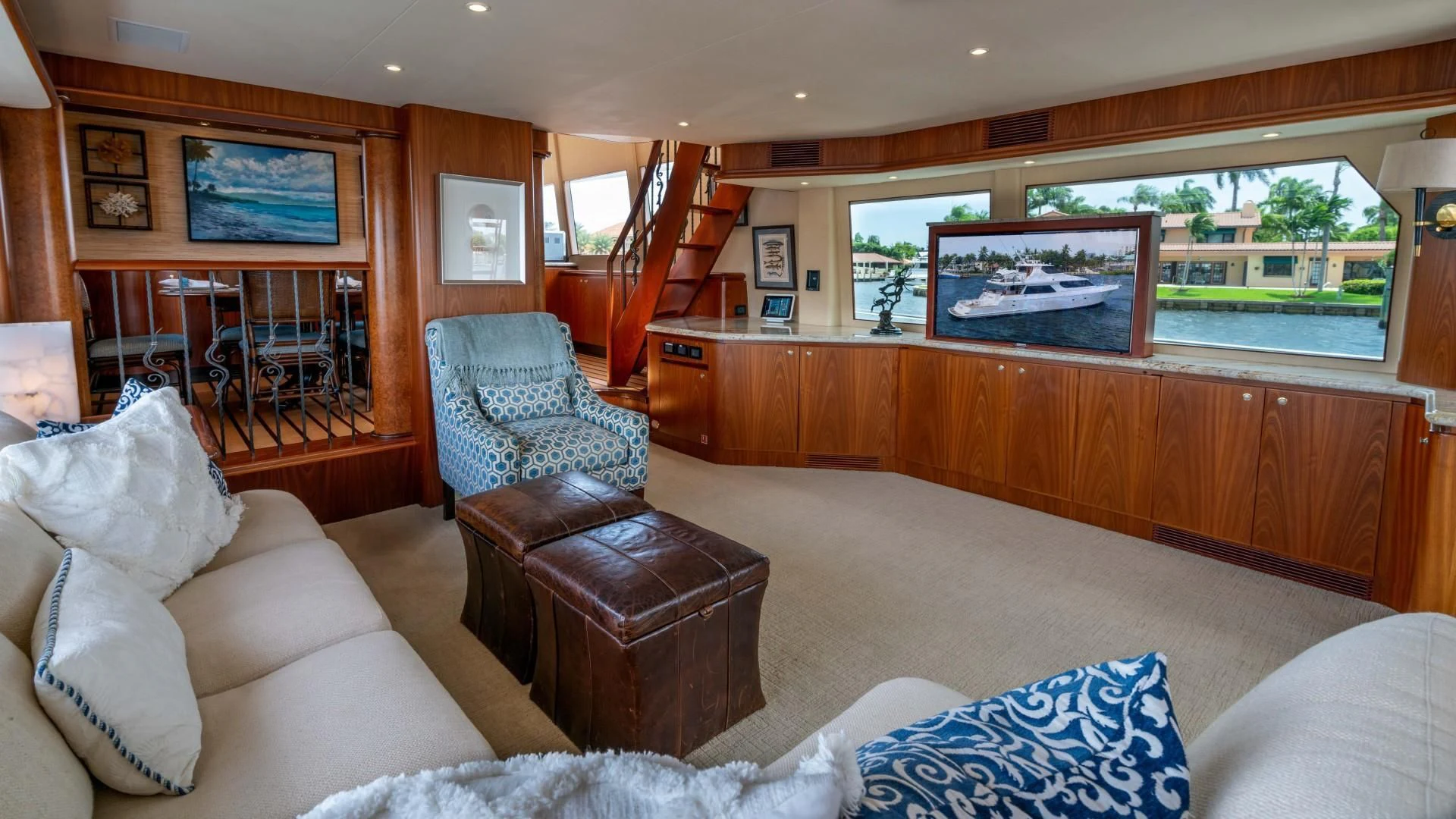 a living room with a large window aboard FAN TAIL Yacht for Sale