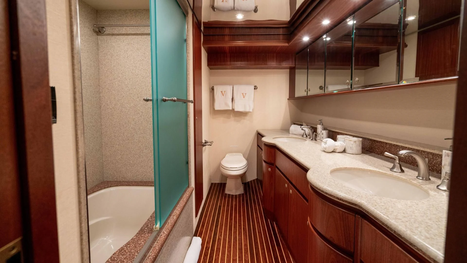 a bathroom with a sink and a bathtub aboard FAN TAIL Yacht for Sale