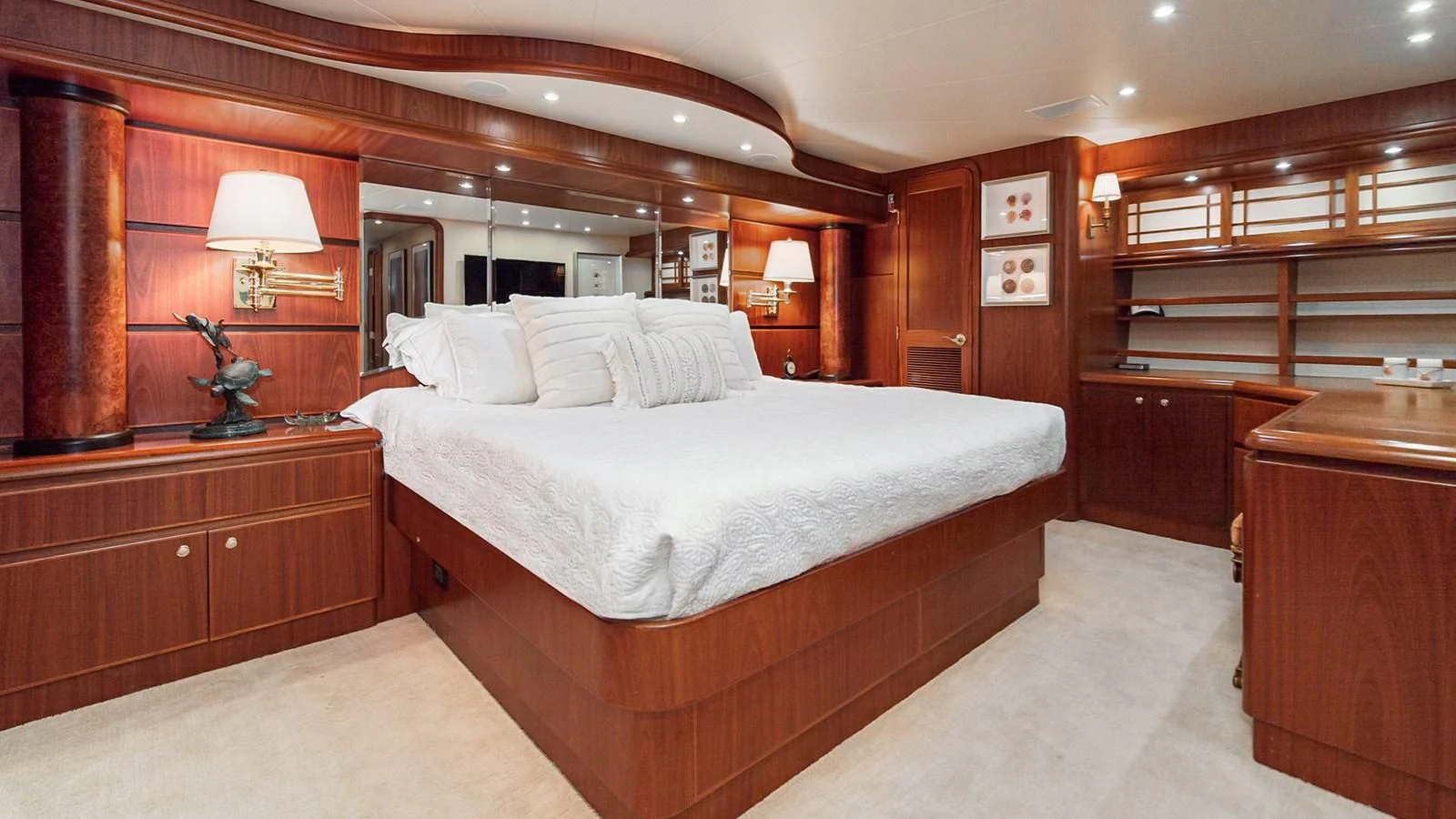 a room with a bed and a desk aboard FAN TAIL Yacht for Sale
