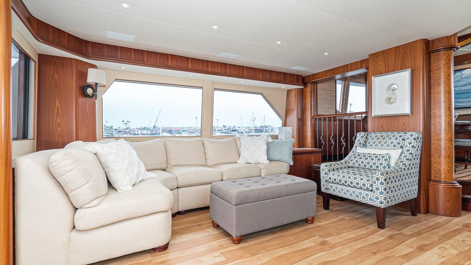 a living room with a couch and a table aboard FAN TAIL Yacht for Sale