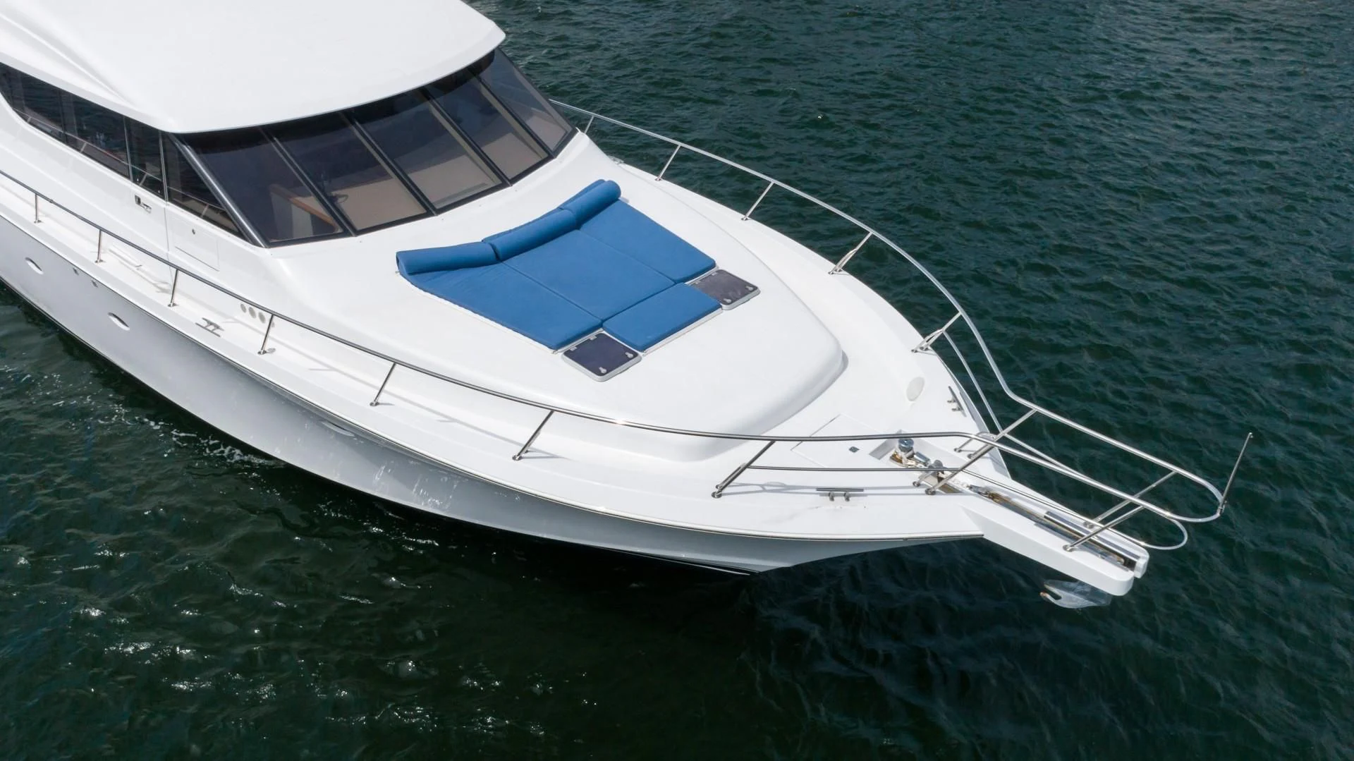 a white yacht on the water aboard FAN TAIL Yacht for Sale