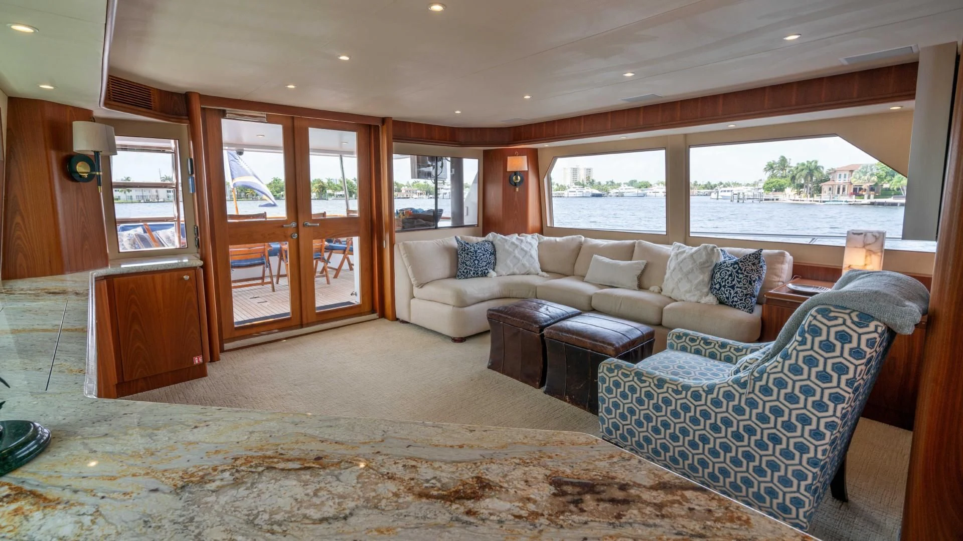 a living room with a large window aboard FAN TAIL Yacht for Sale