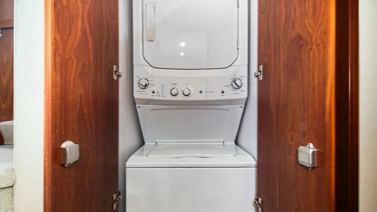a white washer and dryer in a room aboard FAN TAIL Yacht for Sale