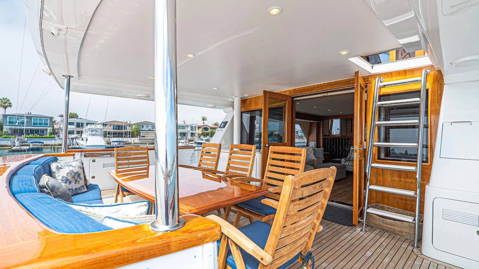 a boat with a table and chairs aboard FAN TAIL Yacht for Sale