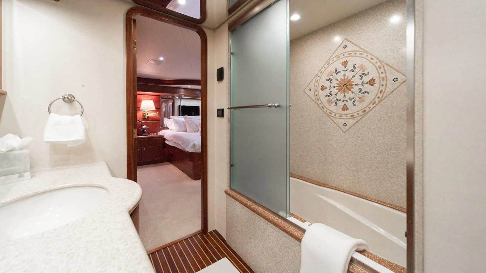 a bathroom with a large mirror aboard FAN TAIL Yacht for Sale