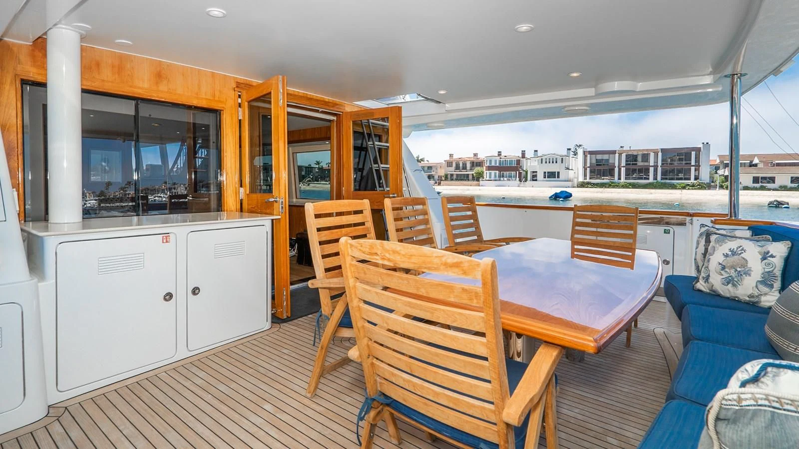 a boat with a table and chairs aboard FAN TAIL Yacht for Sale