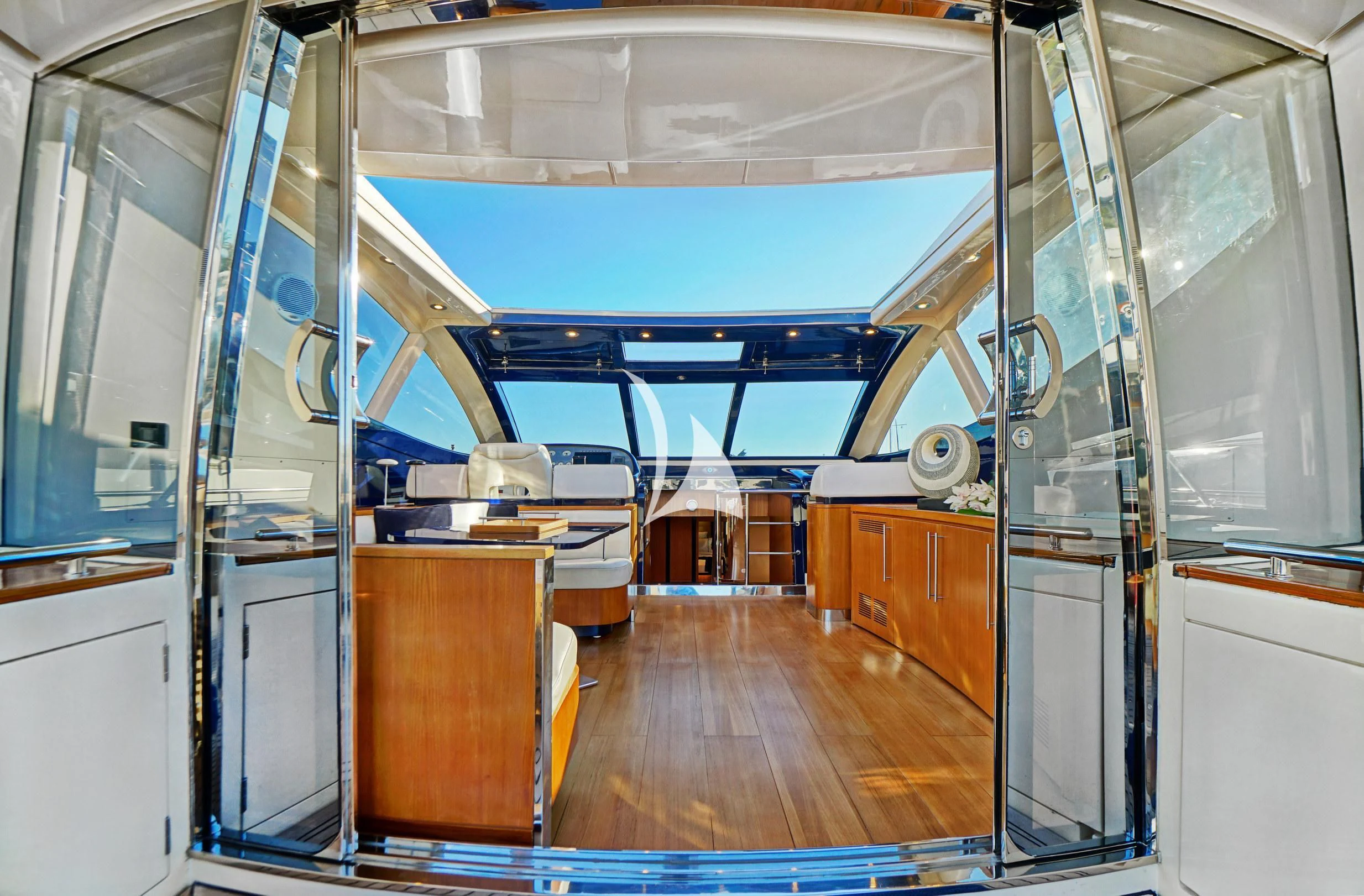 a room with a large glass window aboard SEA U Yacht for Charter