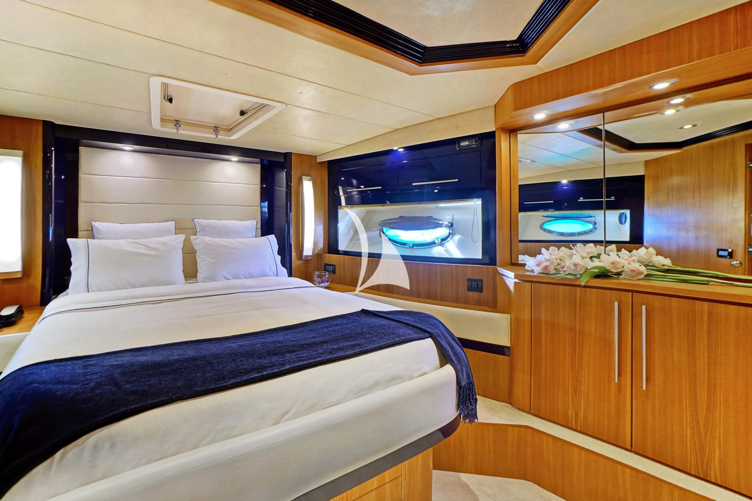 a bed in a room aboard SEA U Yacht for Charter