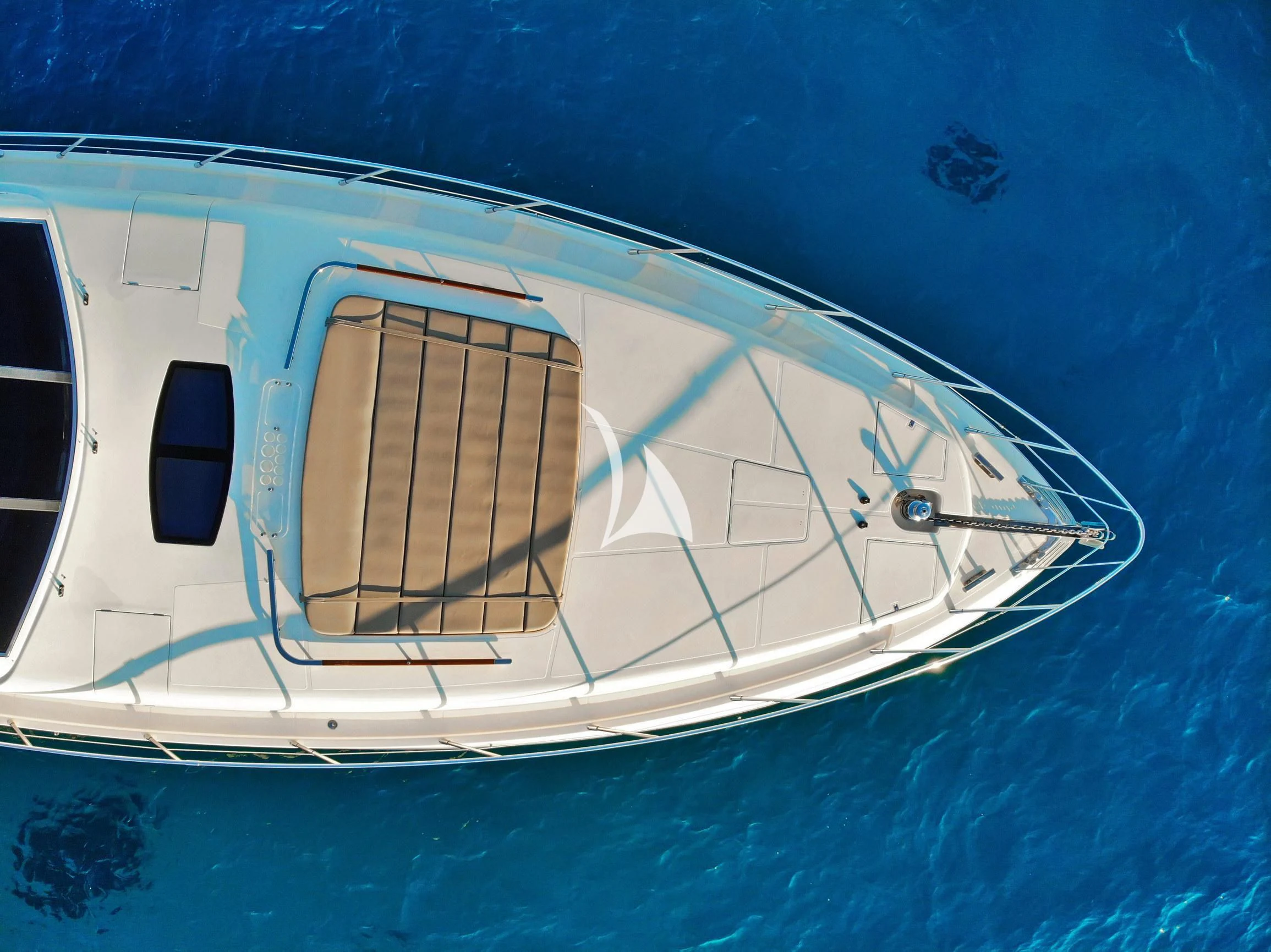 a white boat in the water aboard SEA U Yacht for Charter