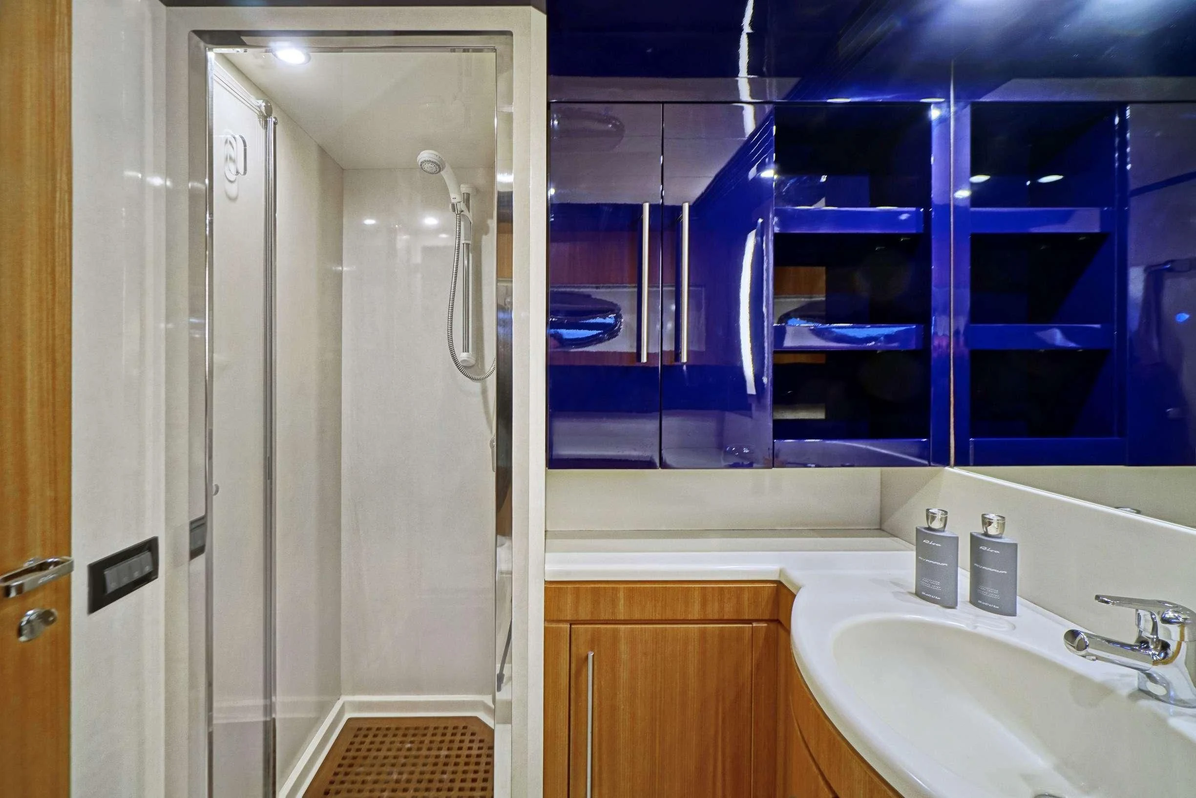 a bathroom with a shower and sink aboard SEA U Yacht for Charter