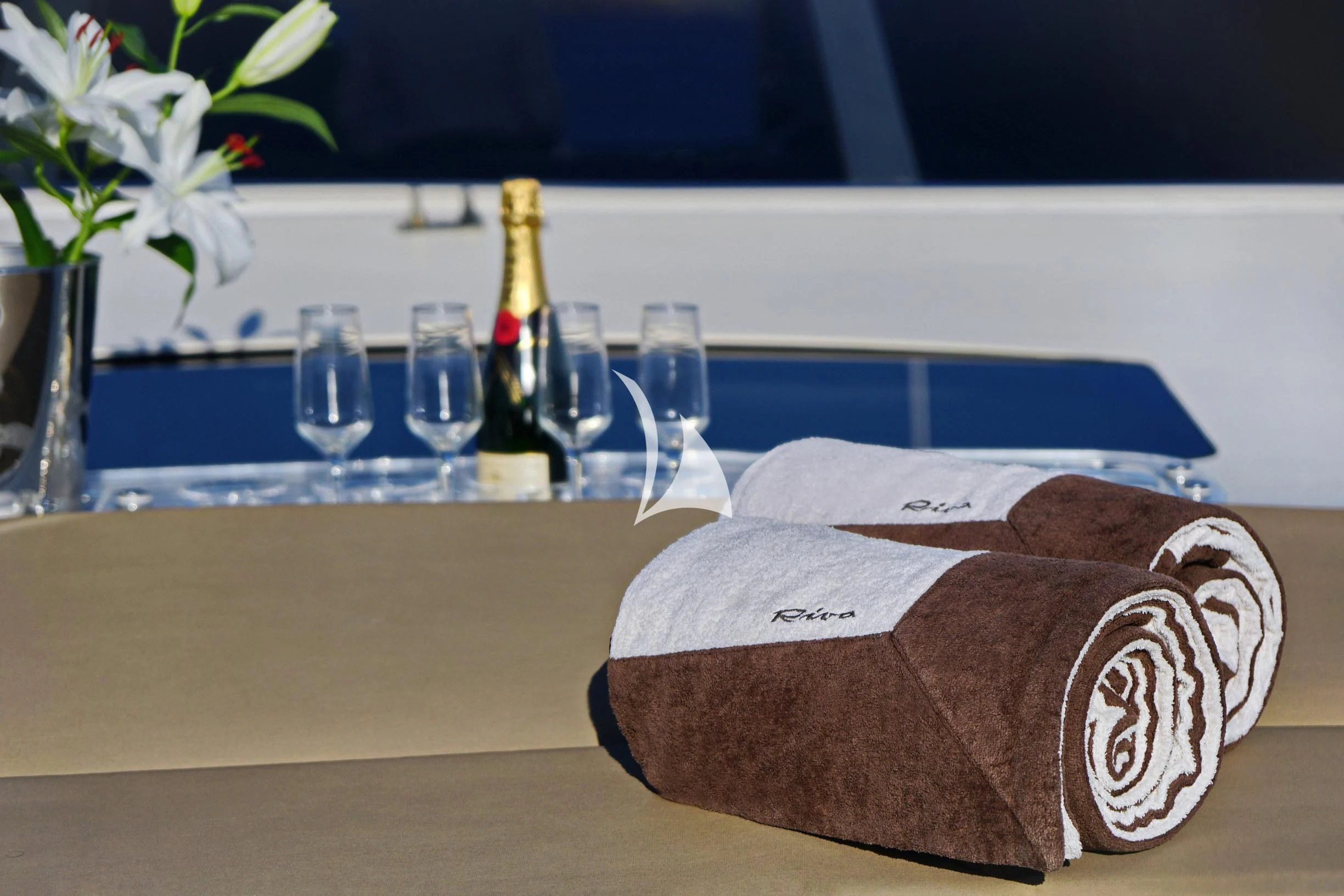 a bottle of wine and a toast aboard SEA U Yacht for Charter