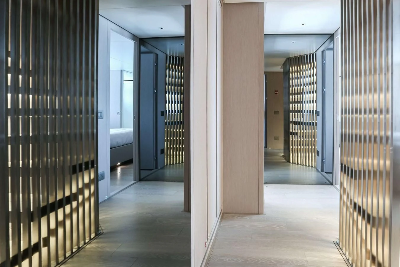 a hallway with a door and a window aboard 2022 SANLORENZO SL120A Yacht for Sale