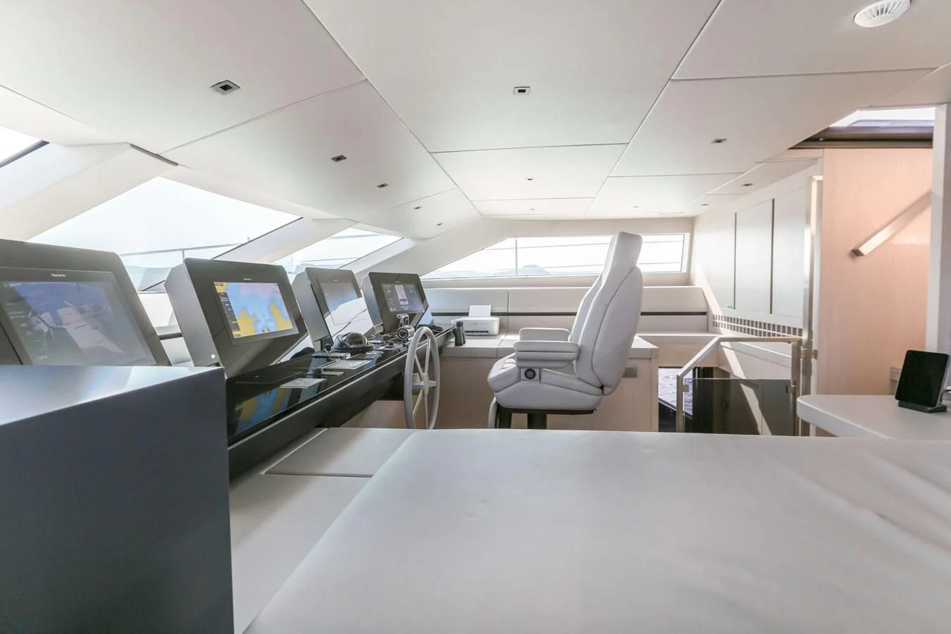 an empty room with computers aboard 2022 SANLORENZO SL120A Yacht for Sale