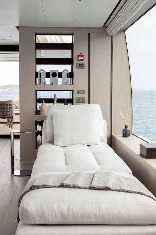 a couch in a room aboard 2022 SANLORENZO SL120A Yacht for Sale