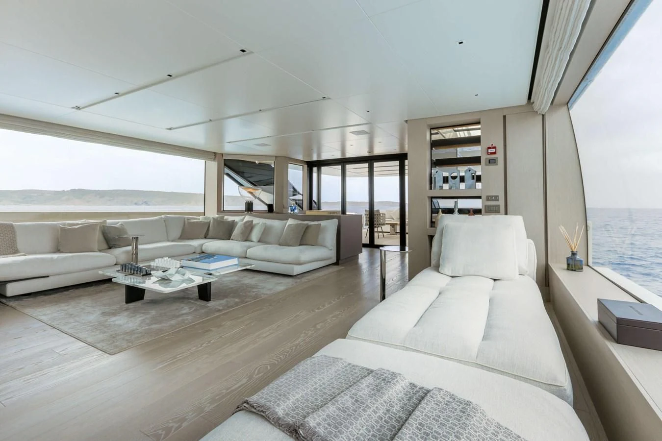 a living room with a large window aboard 2022 SANLORENZO SL120A Yacht for Sale