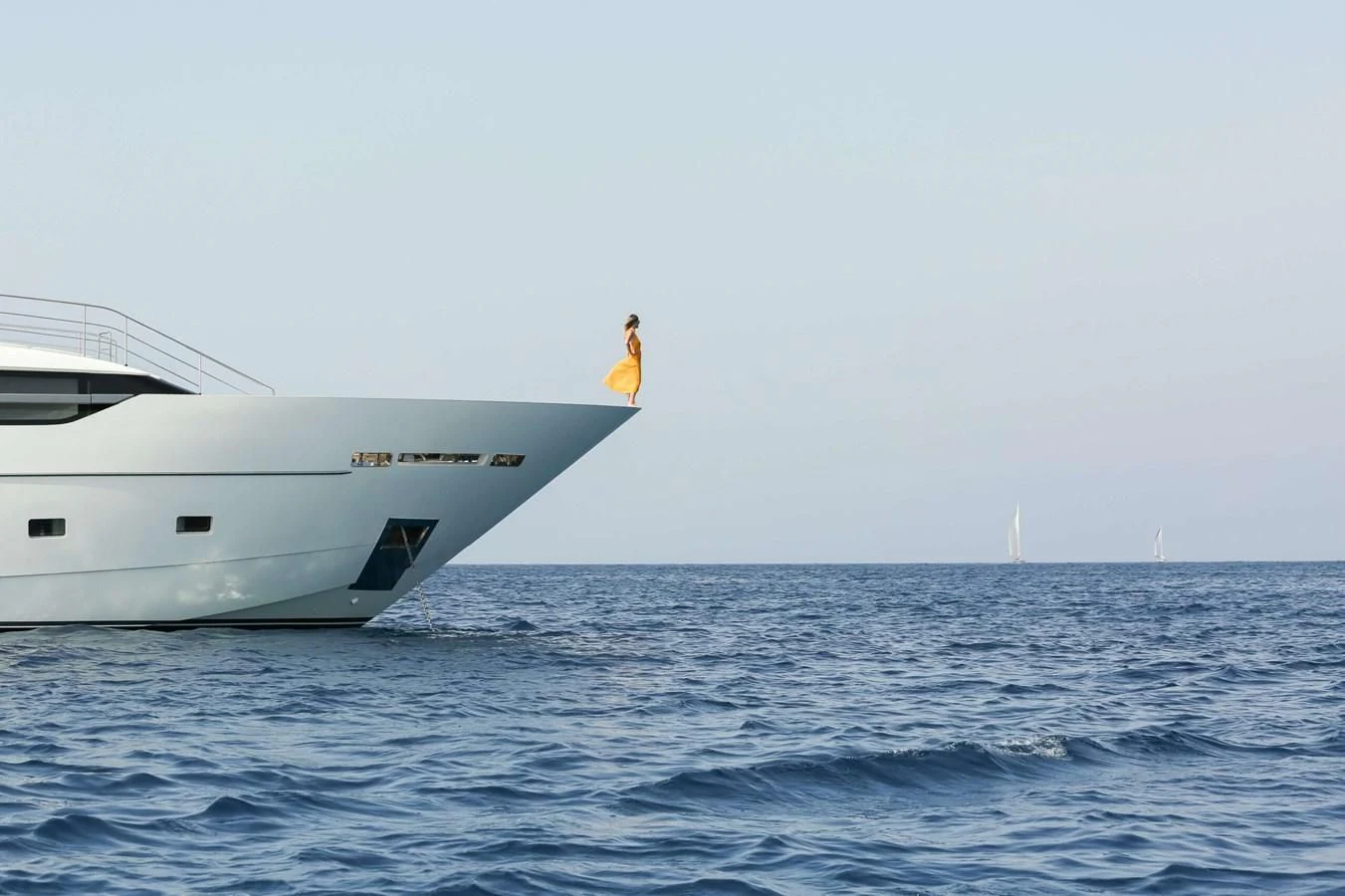a person standing on a boat aboard 2022 SANLORENZO SL120A Yacht for Sale