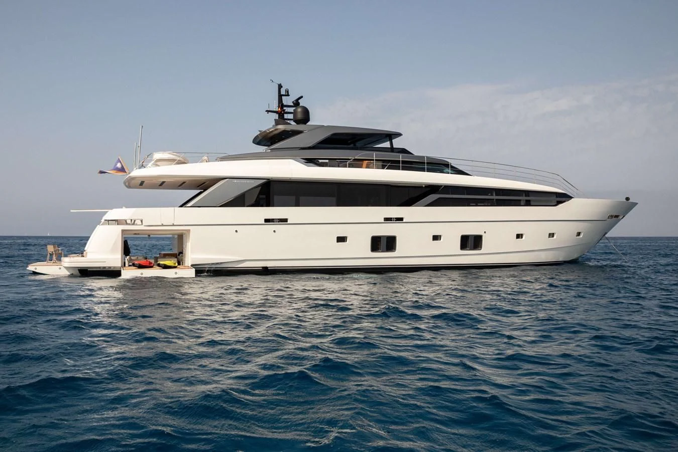 a white yacht in the water aboard 2022 SANLORENZO SL120A Yacht for Sale