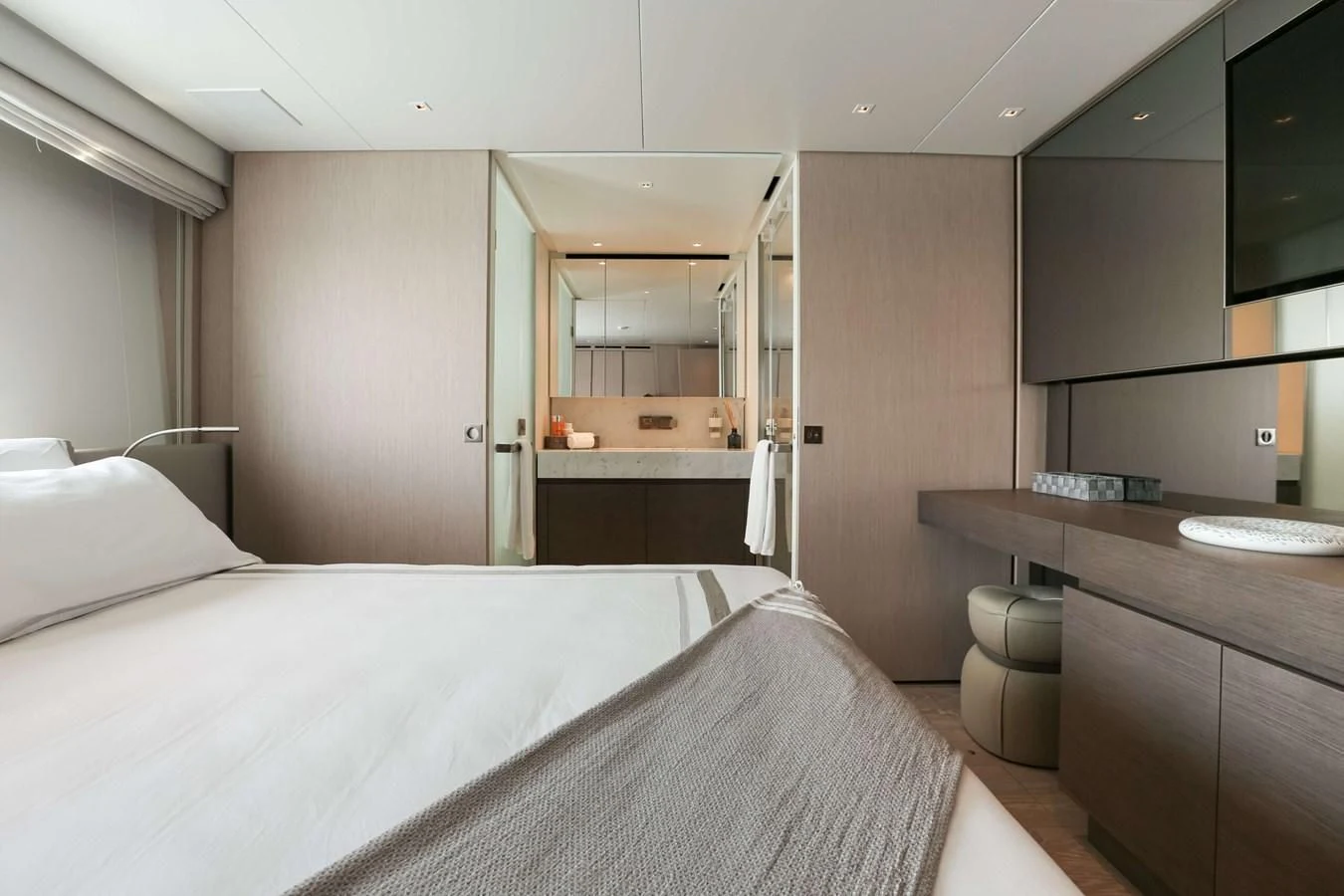 a hotel room with a bed and desk aboard 2022 SANLORENZO SL120A Yacht for Sale