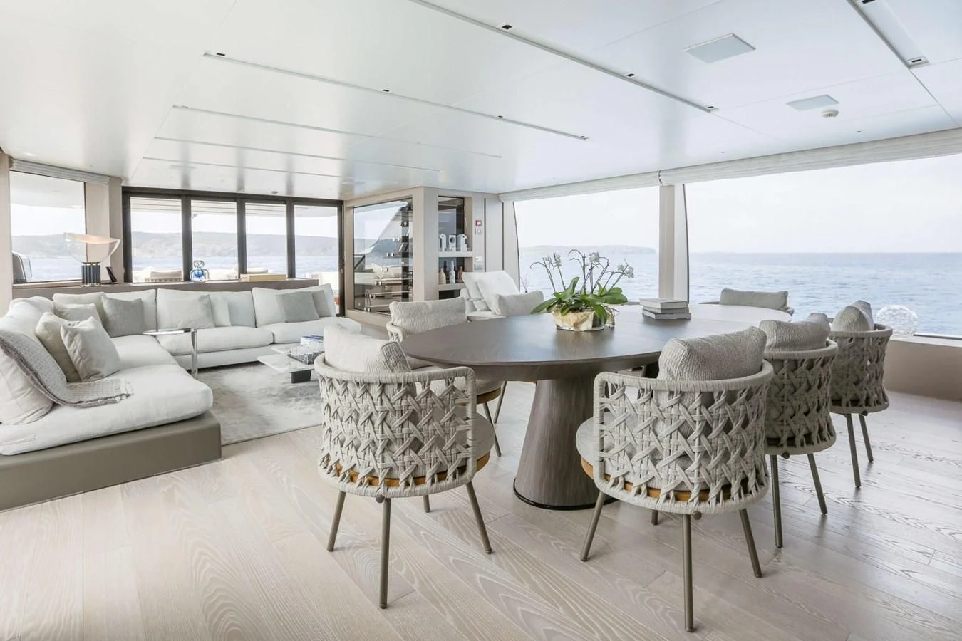 a room with a table and chairs aboard 2022 SANLORENZO SL120A Yacht for Sale