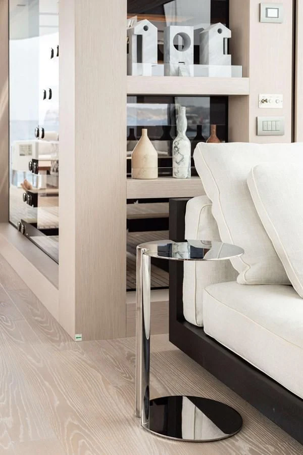 a white couch in a room aboard 2022 SANLORENZO SL120A Yacht for Sale