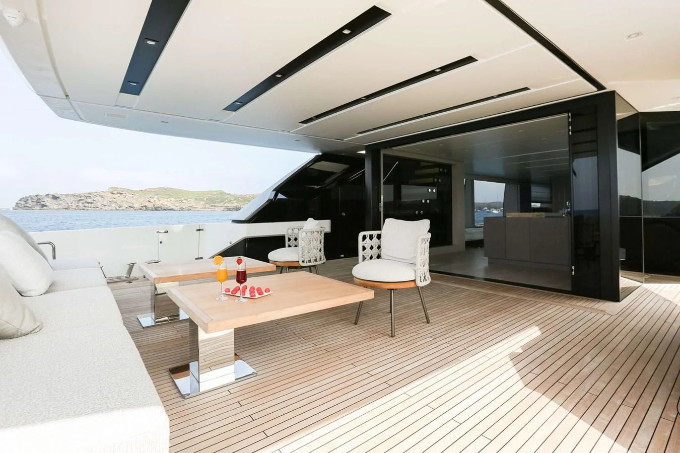 a room with a table and chairs aboard 2022 SANLORENZO SL120A Yacht for Sale
