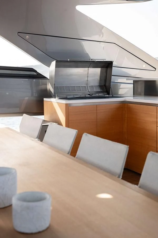 a table with chairs and a microwave aboard 2022 SANLORENZO SL120A Yacht for Sale