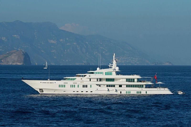 a large white boat in the water aboard SIRAN Yacht for Sale