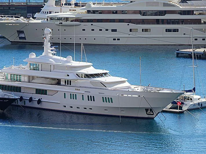 a large white yacht in the water aboard SIRAN Yacht for Sale