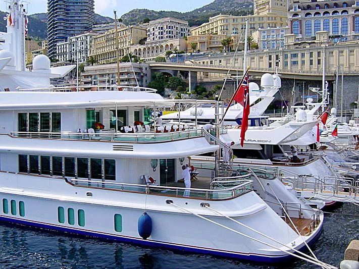 a boat docked in a harbor aboard SIRAN Yacht for Sale