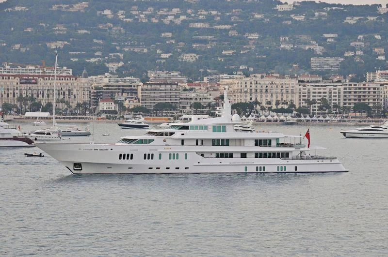 a large white boat in the water aboard SIRAN Yacht for Sale