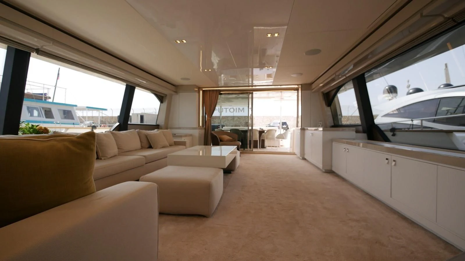 a living room with a couch and a bus aboard MIOTU 4 Yacht for Sale