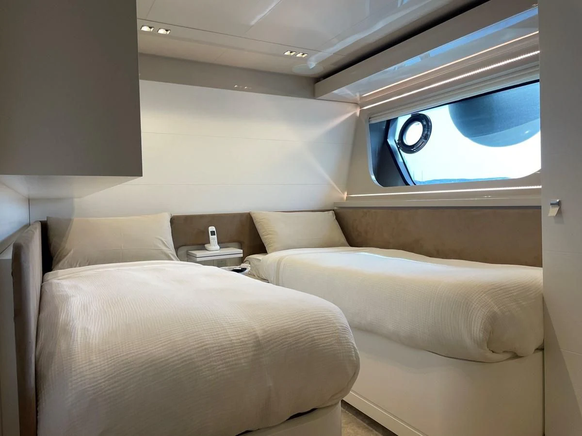 a couple of beds in a room aboard MIOTU 4 Yacht for Sale