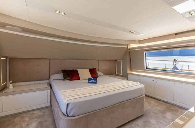 a bed in a room aboard MIOTU 4 Yacht for Sale
