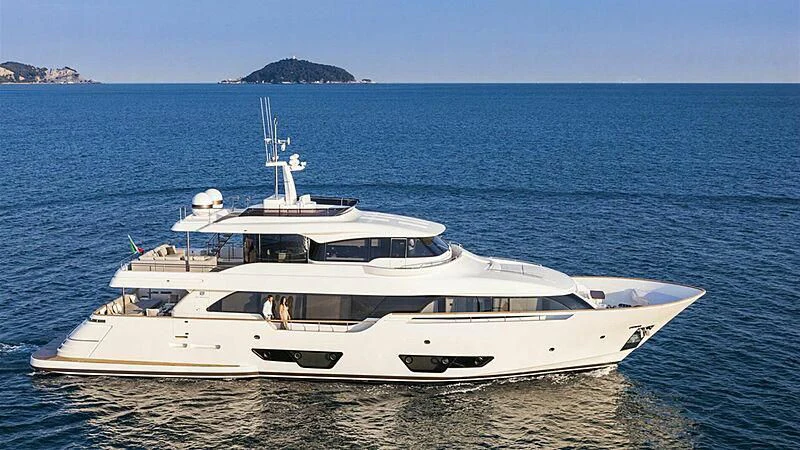a white yacht on the beach aboard MIOTU 4 Yacht for Sale