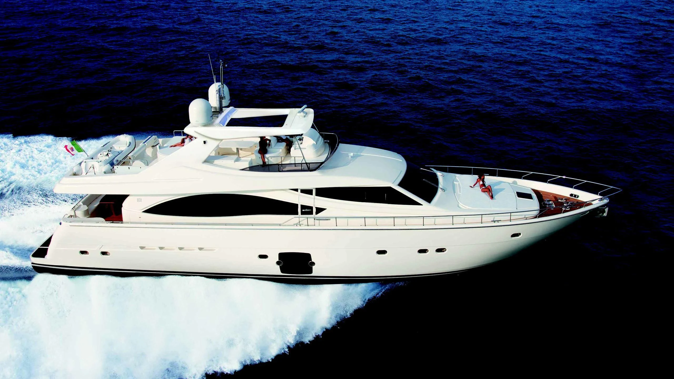 a white yacht on the water aboard SAR Yacht for Sale