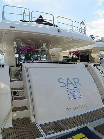 a white rectangular object with a sign on it aboard SAR Yacht for Sale