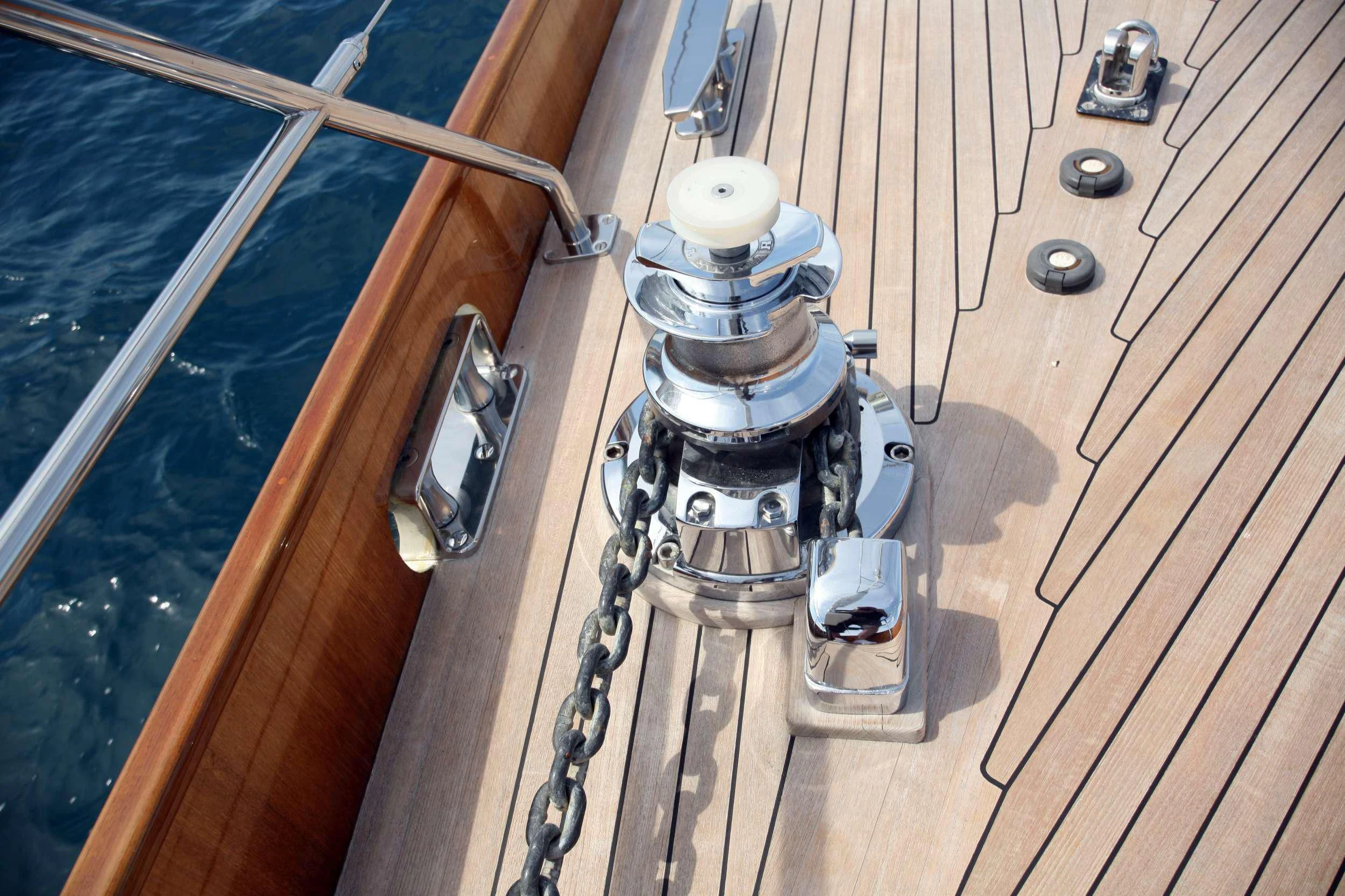 a metal object on a wooden surface aboard MARELLA Yacht for Sale