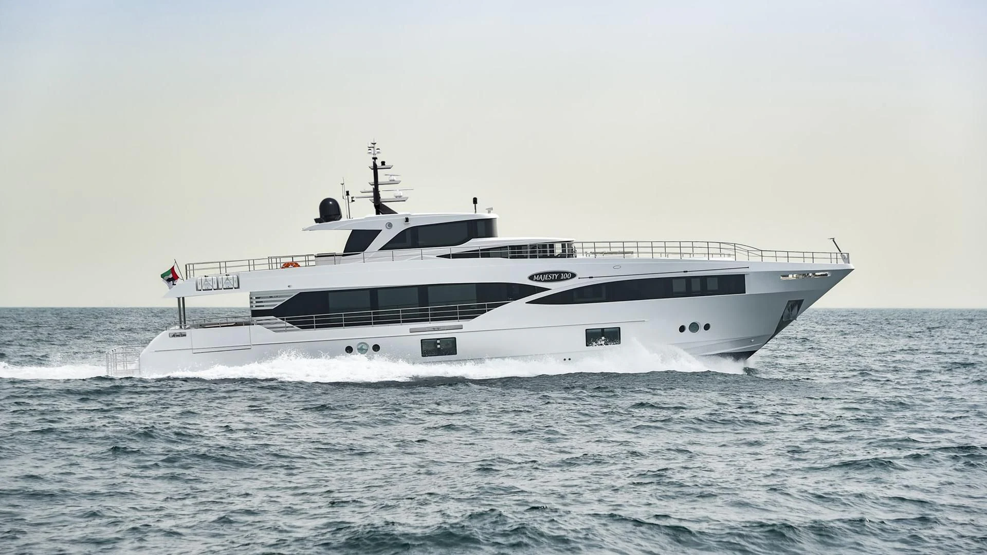 a large white ship in the ocean aboard NAHAR Yacht for Sale