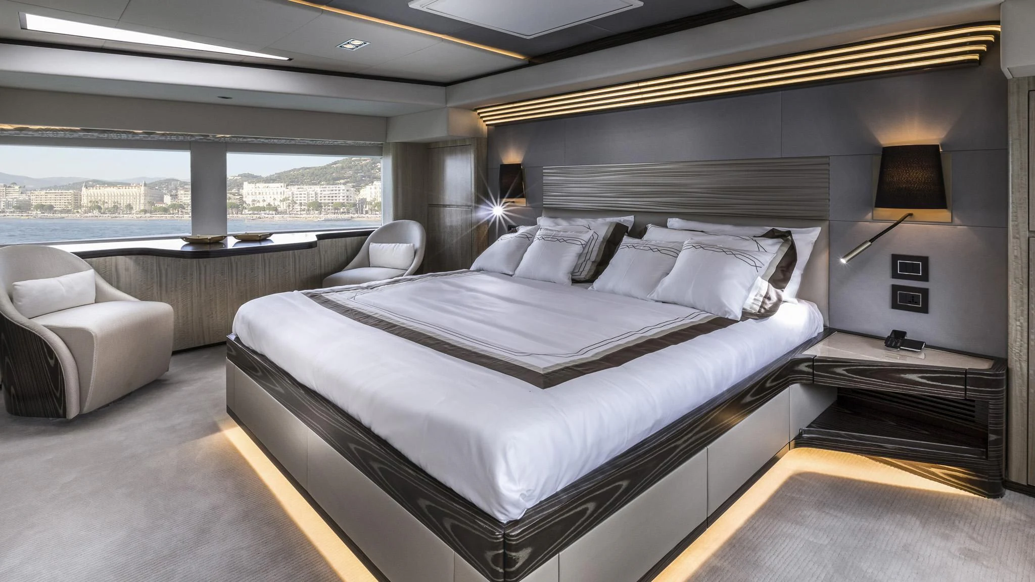 a large bed in a room aboard NAHAR Yacht for Sale