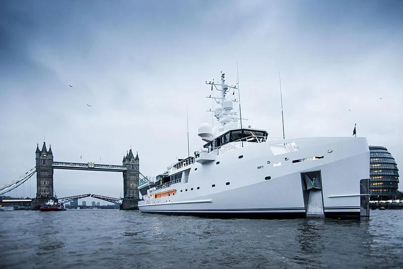 a large white boat in the water aboard GAME CHANGER Yacht for Sale